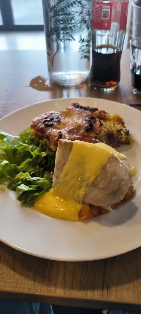 Dos de Cabillaud Sauce Hollandaise Et Courgettes Gratin